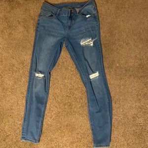 Curvy skinny jeans. Very stretchy. Blue denim.